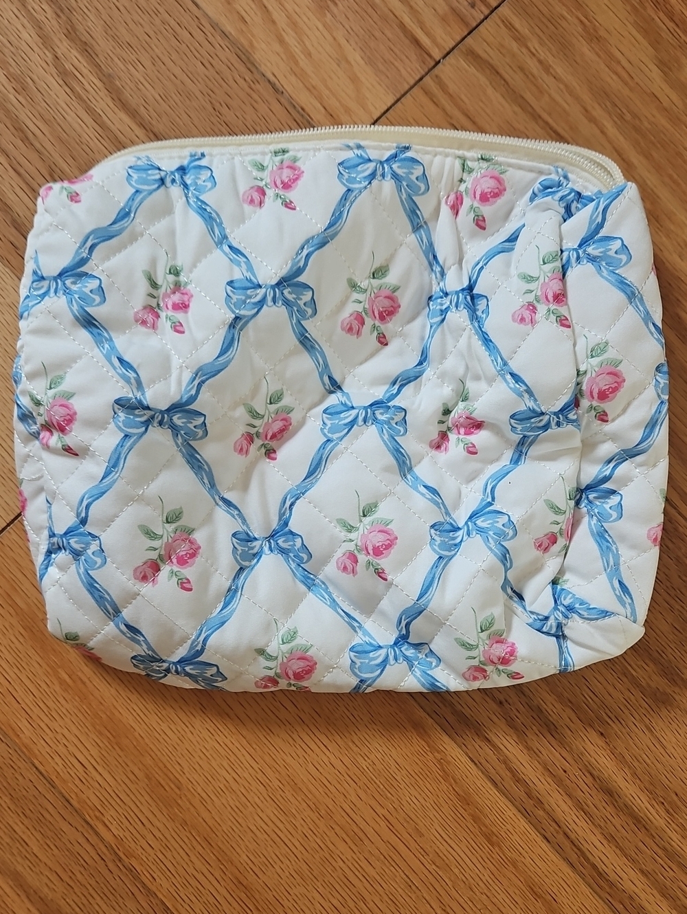 NWOT Quilted Floral Cosmetic Pouch in White with Blue Ribbon Print